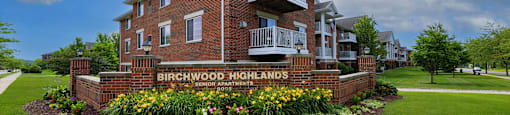 an image of the brickwood highlands sign in front of the building