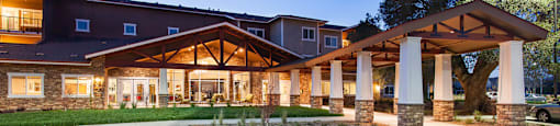 Exterior Entrance at Dusk at The Lodge at Morgan Hills Apartments in Morgan Hill CA