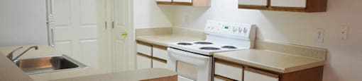 Kitchen space at Whispering Oaks Apartments in Portsmouth VA