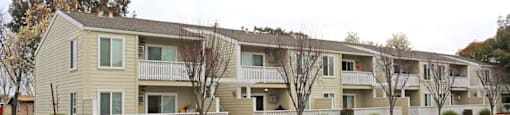 Row of buildings and grass at PARKSIDE BRENTWOOD, California, 94513