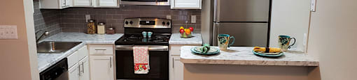 Kitchen with appliances at GEORGETOWN PARK, Georgetown, TX, 78628