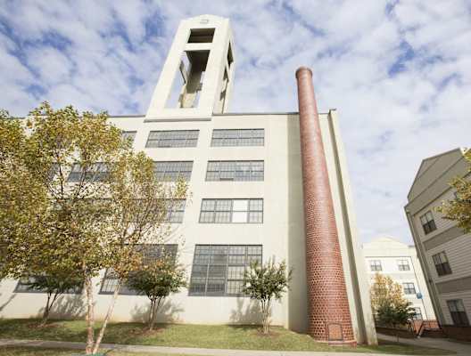 a large brick chimney on the side of a building