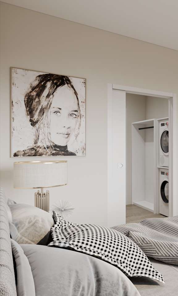 A bedroom with a bed, a television, and a painting on the wall.