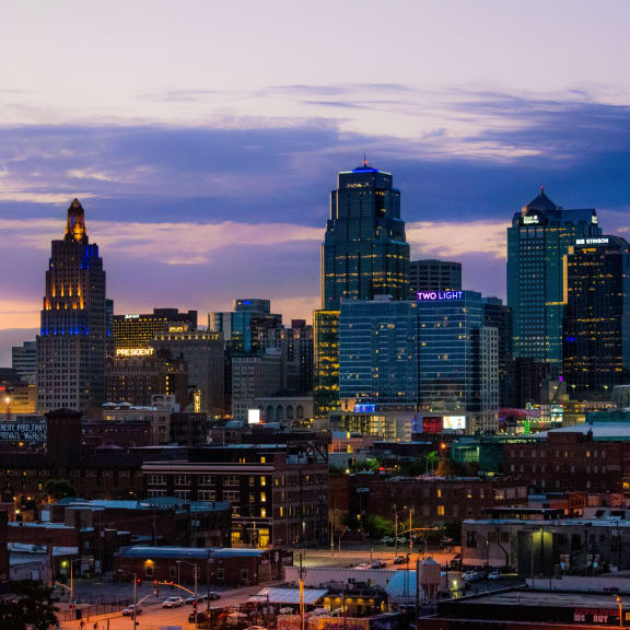 a view of the philadelphia skyline at dusk