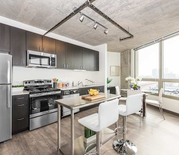 a kitchen and dining area at Lakeview 3200 Apartments, Chicago, IL, 60657