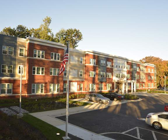 A large building with a flag on it.