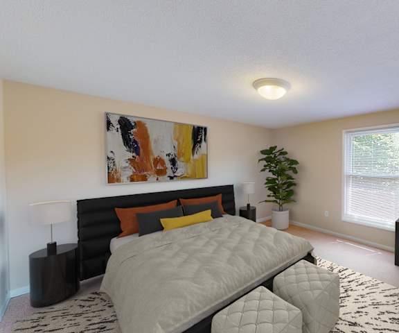 a bedroom with a bed and a dresser and a window