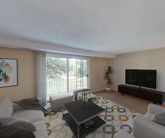 a living room with a couch and a tv