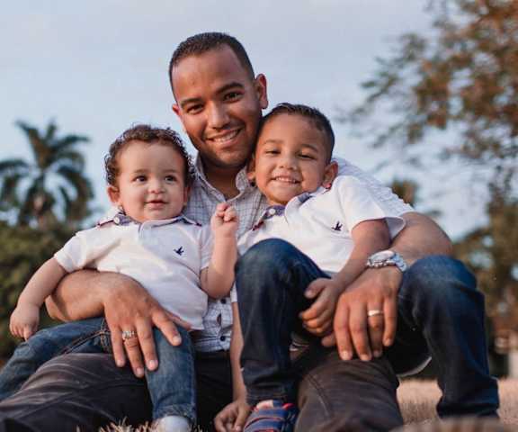 dad enjoying the outdoors with his kids