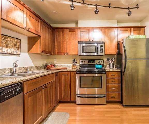 updated kitchen with stainless steel appliances