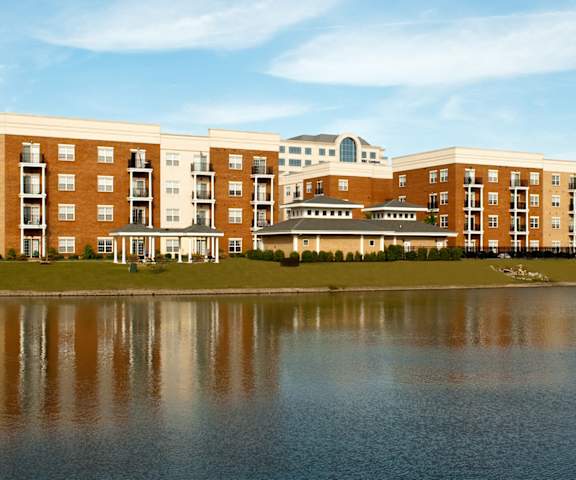 Apartment buildings overlooking pond