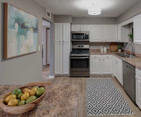 kitchen with white cabinets and stainless steel appliances