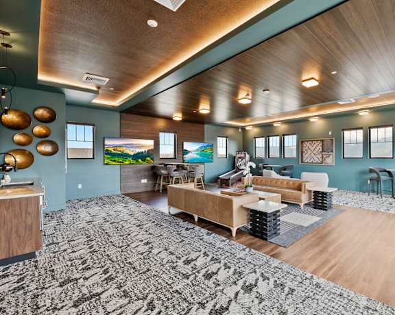 a living room with couches and chairs and a piano
