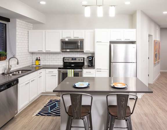 Kitchen at Confluence on 3rd Apartments in Downtown Des Moines