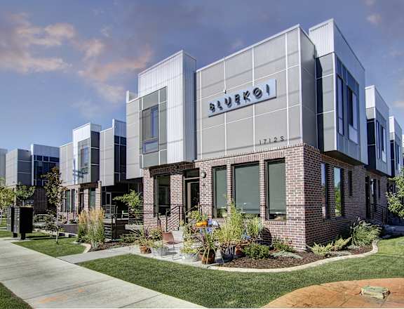 a building with a blueedo logo on the side of it