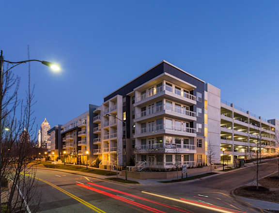 picture of an apartment building at night