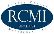 a blue logo with white letters on a white background