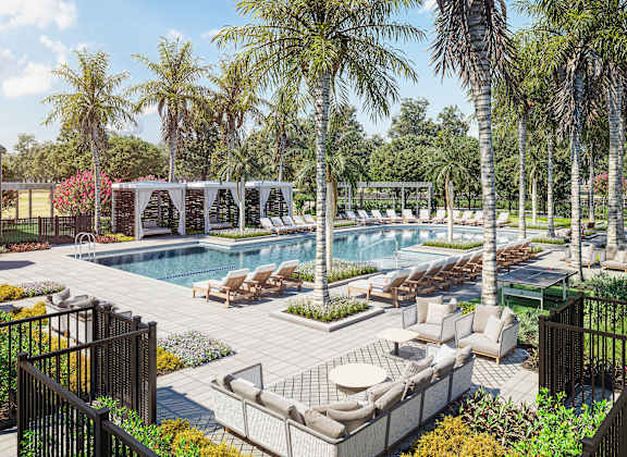 A pool surrounded by palm trees and lounge chairs.