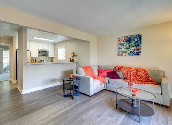a living room with a couch and a table