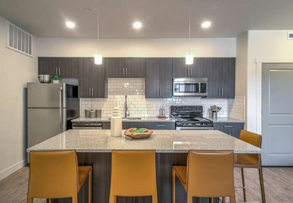 furnished model living room and kitchen