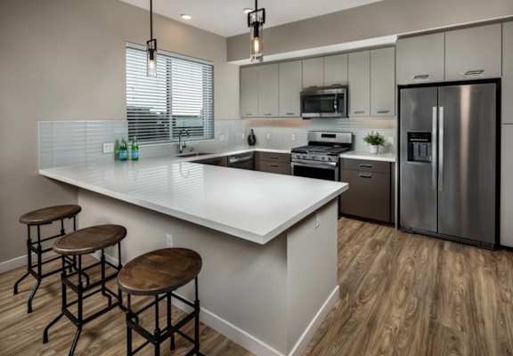 Fitted Kitchen With Island Dining at AV8, San Diego, CA, 92101