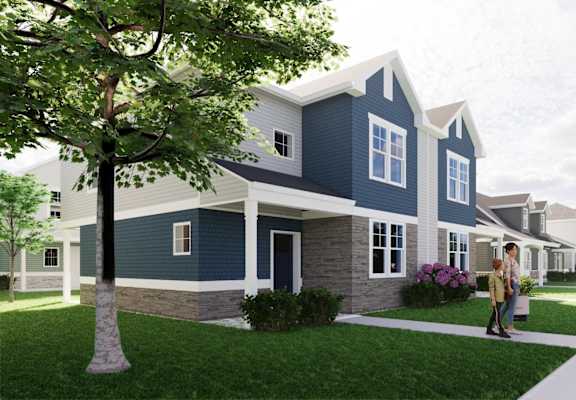 A blue and white house with a family standing outside.