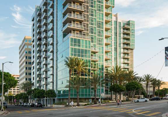 a rendering of a tall building on a city street  at Vue, San Pedro, California 90731
