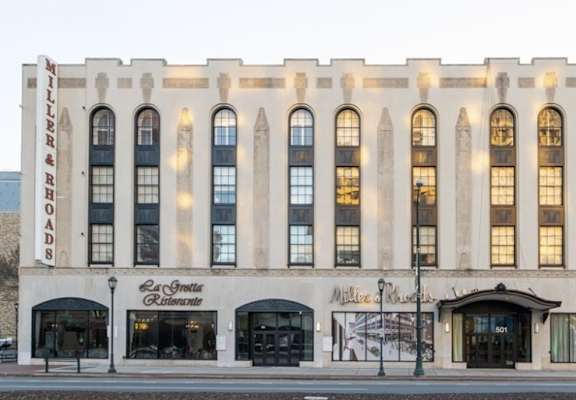 A building with a sign that says La Cresta Residence.