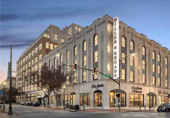 A large building with a sign that says "Miller & Beards" on it.