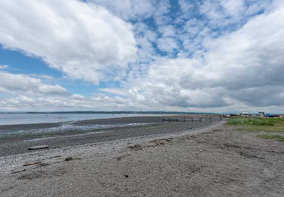 a view of the beach from the car park
