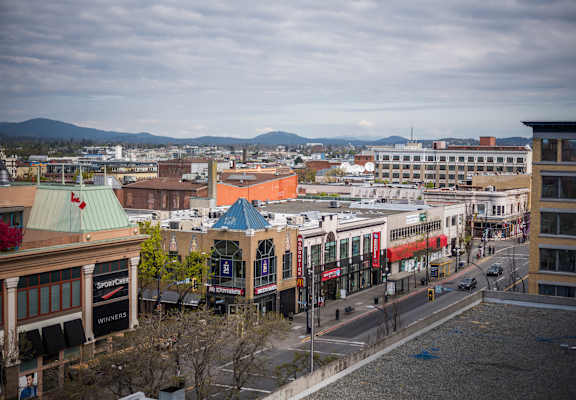 a view of the city from the top of a building