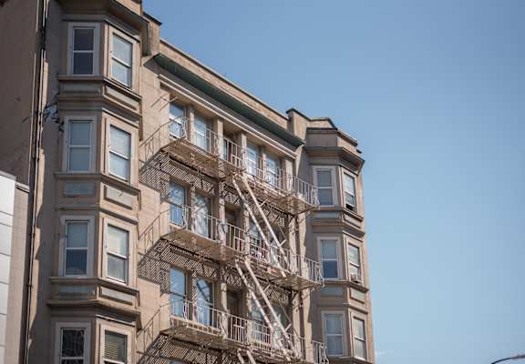 a view of the top of a building with a fire escape
