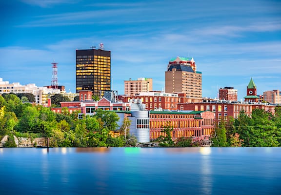 a view of the boston skyline from across the water