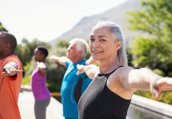 a group of people doing yoga