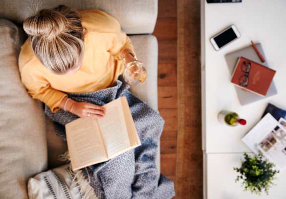 Woman Reading on couch at Whitney Gray, Portland, OR 97205 ?