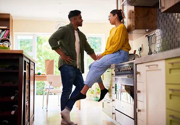 Young couple hanging out in the kitchen  at The Clubhouse at Port Orchard, Washington, 98366