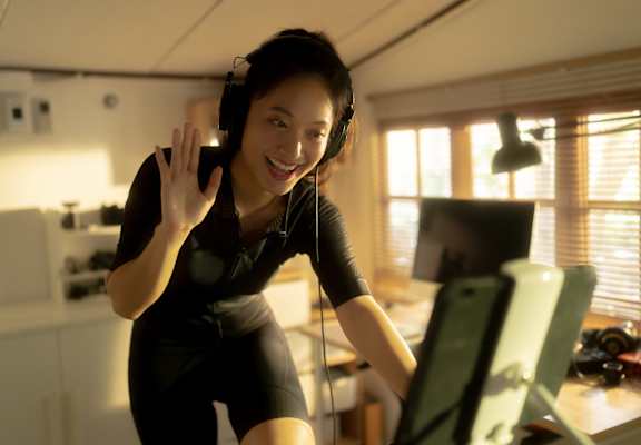 Young woman working out from home at Stonebridge, Connecticut, 06029