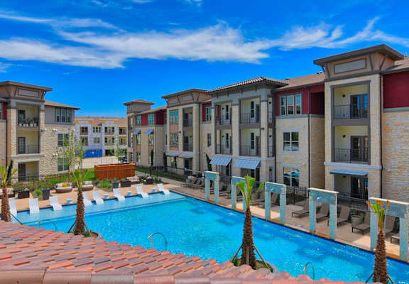 resort style pool and lounge area at Park at Rialto Apartments, San Antonio, TX 78257arge Balcony at Park at Rialto Apartments, San Antonio