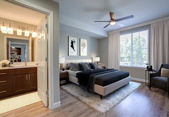 wood floor in bedroom, with high ceilings