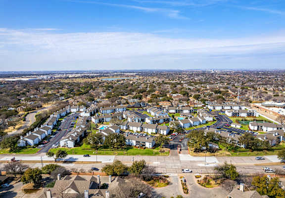 an aerial view of a neighborhood of houses in a city at Keller Oaks, Texas, 75006