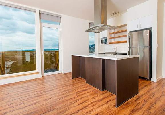Kitchen Bar With Granite Counter Top at Lower Burnside Lofts, Oregon, 97214