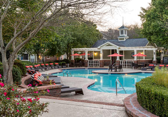 Swimming Pool with Lounge Seating with leasing office exterior at Wyndchase at Aspen Grove, Franklin, TN, 37067