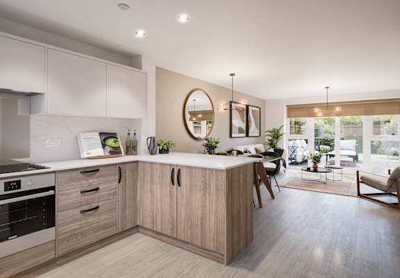 an open plan kitchen and dining area in a 555 waverly unit
