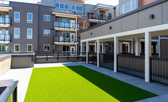 a view of the courtyard at the vue at creve coeur apartments in creve at Bridgeview 125 in University Place, WA