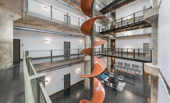 a spiral sculpture in the center of the building