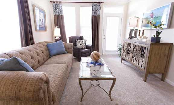 a living room with a couch and a coffee table