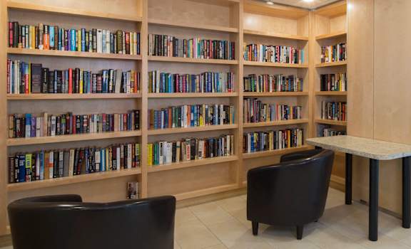 Mount Carmel Gardens senior apartments in jacksonville, florida community room well-stocked library