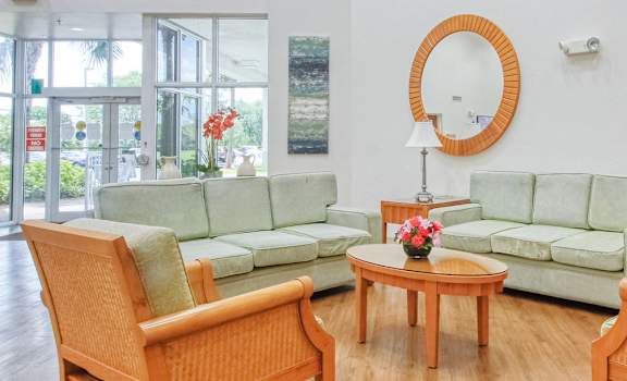 Lounge furniture and large mirrors in Lobby of Villa Regina