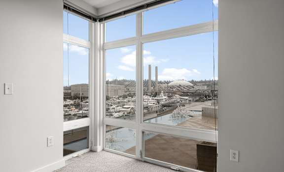 a view of the refinery from a window in a living room