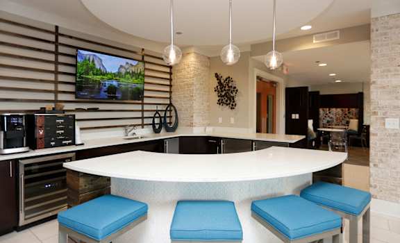 Eat-In Table With High Chairs In Clubhouse at Link Apartments® West End, Greenville, 29601